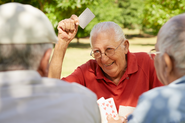 group of seniors playing cards